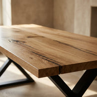 Close-up of Rustic Classic 125' Oak Table highlighting thick tabletop, natural grain, epoxy details, and polished surface in a rustic-modern interior.